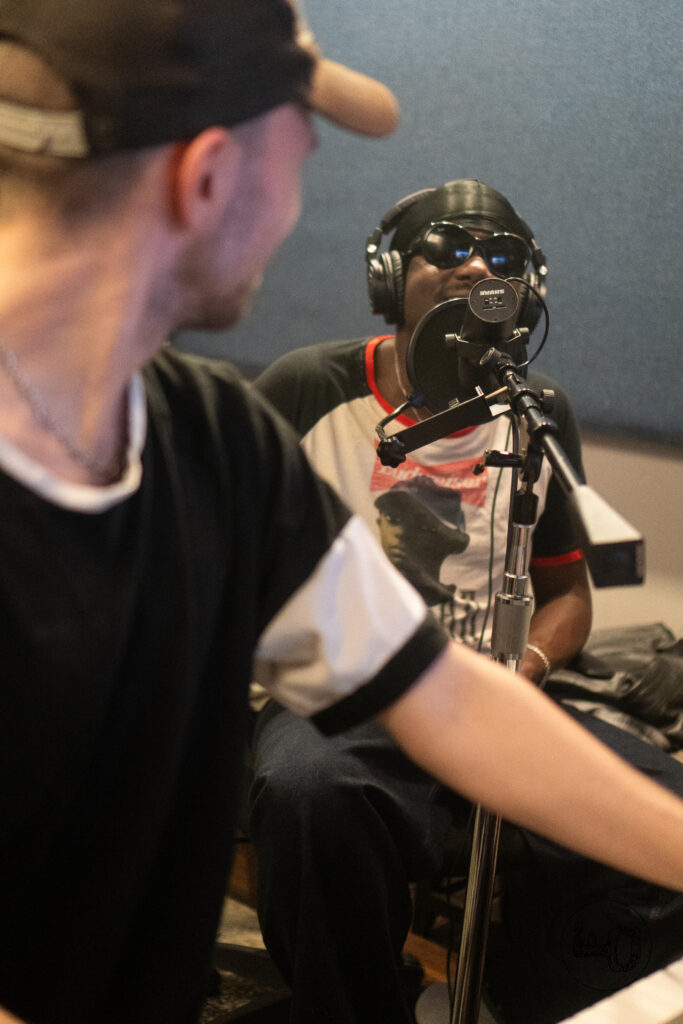 Men laughing and making music