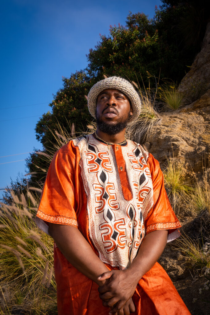 Man in African dress in nature