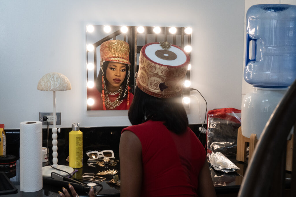 Woman checking makeup in mirror